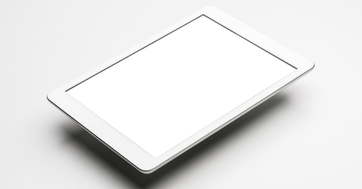 Create a minimalist design of an iPad charging with a blue white or gray color scheme